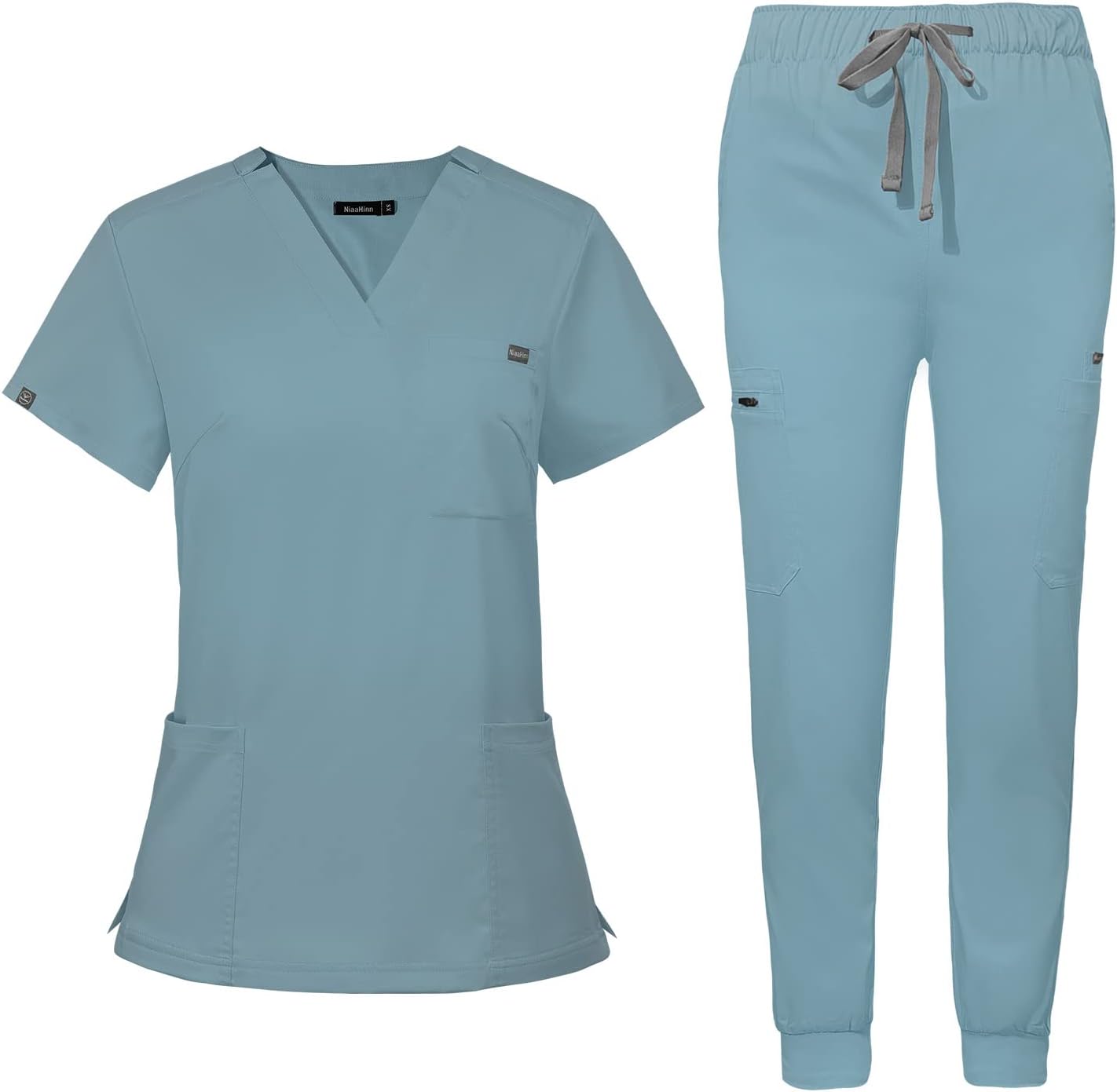 MediWear women’s V‑neck stretch scrubs being worn by a nurse in a busy ER hallway